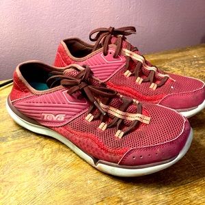 Teva pink running shoes.